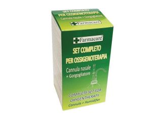 Set per ossigenoterapia con sostegno a occhiale munito di tubo di collegamento flessibile antiotturamento ed un gorgogliatore per umidufucazione